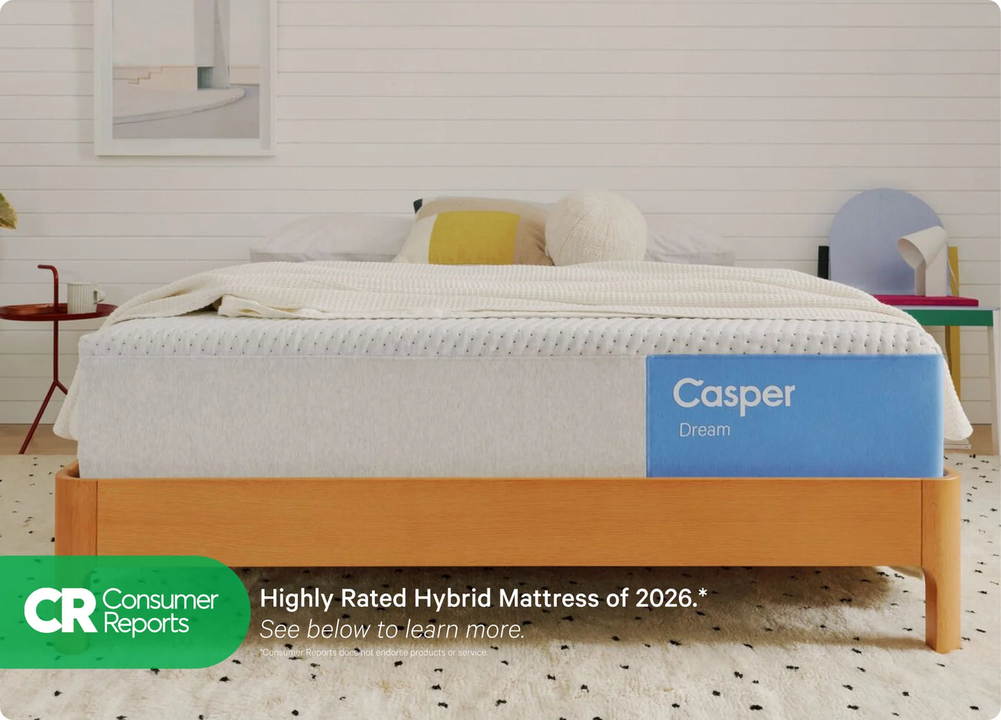 Casper mattress on a bed with a white wall and minimal decor.