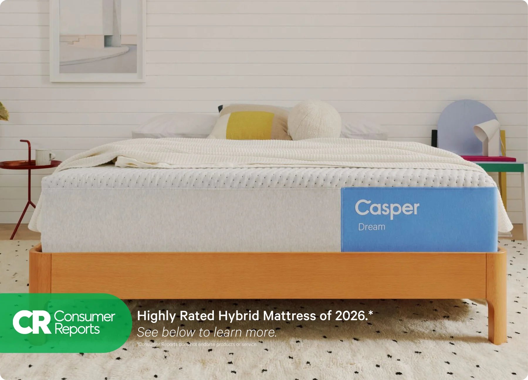Casper mattress on a bed with a white wall and minimal decor.