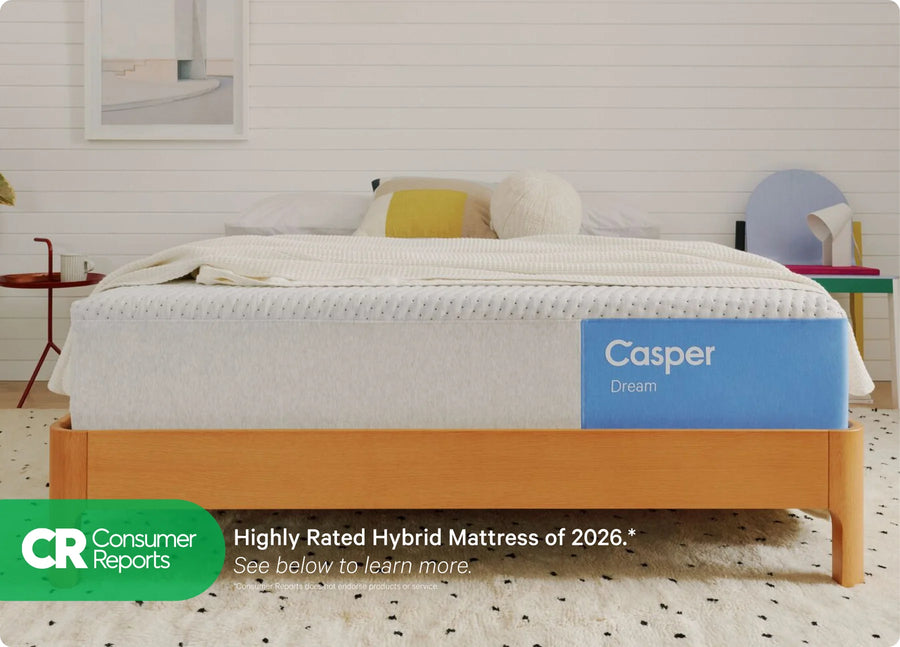 Casper mattress on a bed with a white wall and minimal decor.