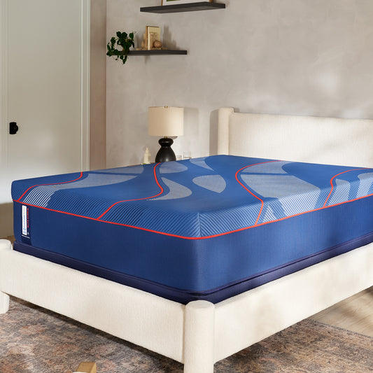 Albany II Medium hybrid mattress in a bedroom